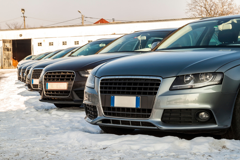 Parked Cars on a Lot. Row of New Cars on the Car Dealer Parking